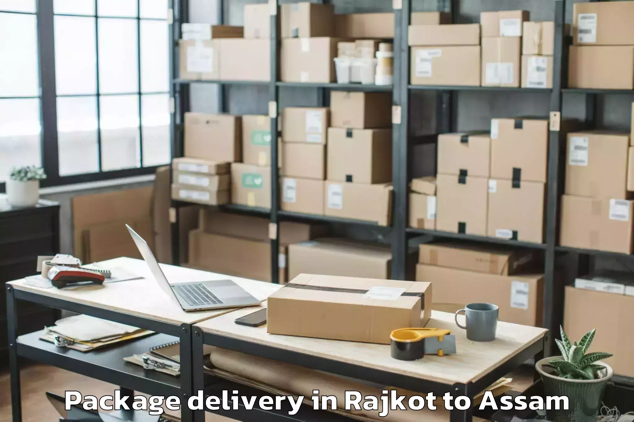 Quality Rajkot to Golokganj Pt Package Delivery